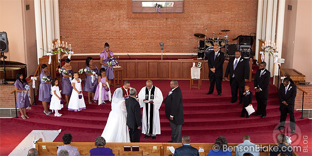 The wedding party at the alter