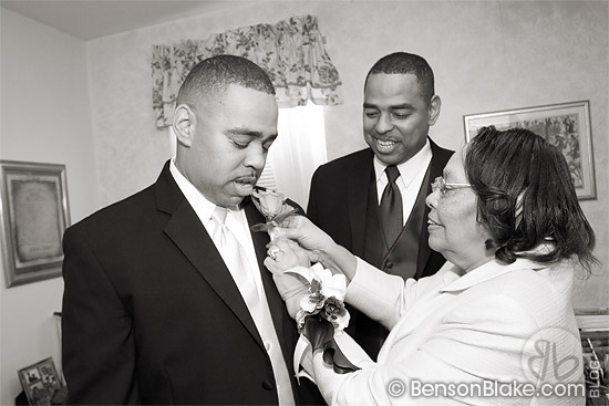 Burton pinned by his mother while his brother looks on