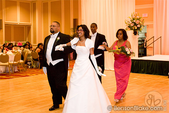 Debutante with her parents and escort Debutante with her parents and escort